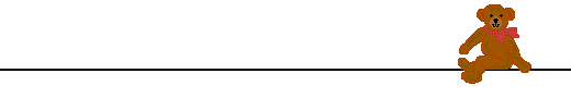 teddy bear sitting on a black divider line